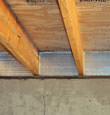 SilverGlo™ insulation installed in a floor joist in Villanova
