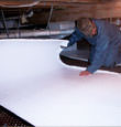 Cherry Hill insulation being installed in a crawl space.
