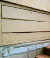 an old-fashioned crawl space door in Newark about to be replaced