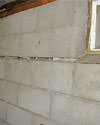 Severely buckling foundation walls in a home in Kennett Square in need of repairs.