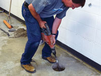 Coring the concrete of a concrete slab floor in Villanova