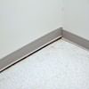 A partition wall separating from the floor in a Philadelphia home.