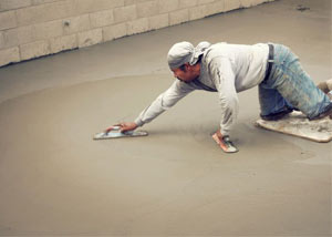 smoothing out the grout in a slab releveling project in Cherry Hill