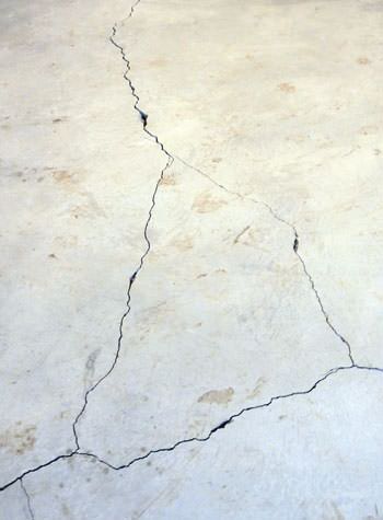 severely cracked, heaving slab floors in a home in Wilmington