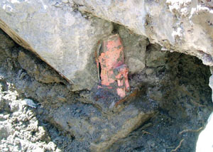 Failed concrete underpinning meant to repair a foundation issue in New Castle.