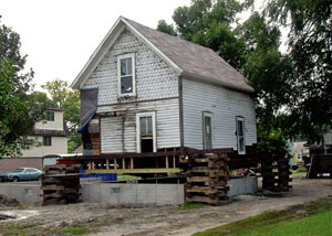 A severely damaged home foundation that is undergoing replacement in Camden.