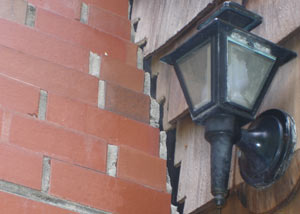 A tilting chimney in Merion Station showing serious foundation damage.