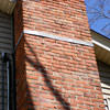 A tilting chimney on a Norristown home with a leaning, tilting chimney that was temporarily repaired.