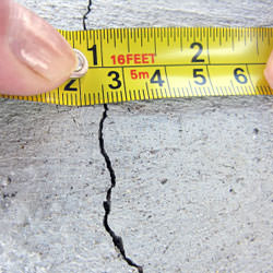 A crack in a poured concrete wall that's showing a normal crack during curing in Bensalem