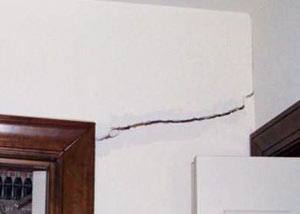 A large drywall crack in an interior wall in Wilmington