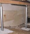 A system of crawl space support posts adding structural support to a crawl space in Bensalem