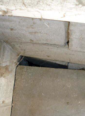 inward rotation of a foundation wall damaged by street creep in a garage in Camden