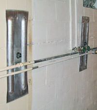 A foundation wall anchor system used to repair a basement wall in Reading