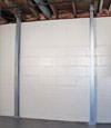 A steel i-beam system installed on a Drexel Hill foundation wall