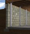 I-beam foundation wall supports installed in a Norristown basement.