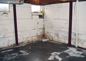 A failed, rusty i-beam foundation wall system installed in Vineland.