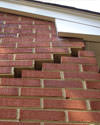 Serious damage to a foundation wall due to settlement of a home in Philadelphia