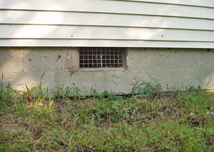 Open crawl space vents that let rodents, termites, and other pests in a home in Drexel Hill