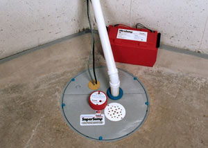 A sump pump system with a battery backup system installed in Reading