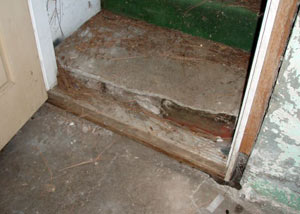 A flooded basement in Trenton where water entered through the hatchway door