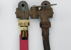 Two washer hoses, one of them our heavy duty FloodChek® hose, next to an old, rusty rubber washing machine hose.