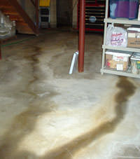 Flooding entering a basement through a floor crack in Philadelphia