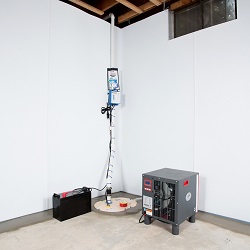 Sump pump system, dehumidifier, and basement wall panels installed during a sump pump installation in Quakertown