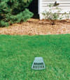 A buried gutter drain downspout extension installed in a Bensalem home