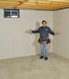 Cherry Hill basement insulation covered by EverLast™ wall paneling, with SilverGlo™ insulation underneath