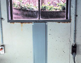 Repaired waterproofed basement window leak in Camden