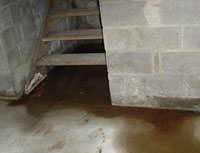 Water Pouring into a Norristown Basement through Hatchway Doors